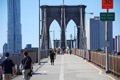 09 Walking Toward The First Cable Tower Crossing New York Brooklyn Bridge With Gehry New York.jpg